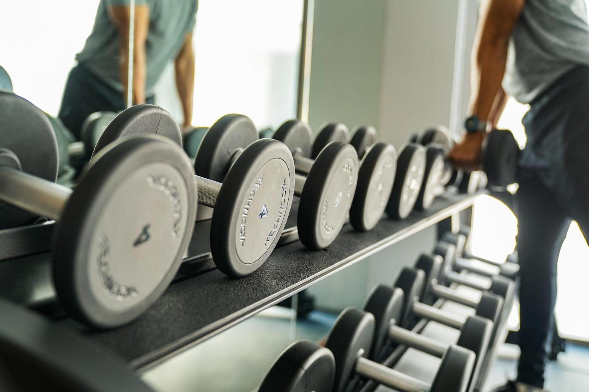 The Salil Hotel Riverside Bangkok Exterior photo Dumbbells on a rack