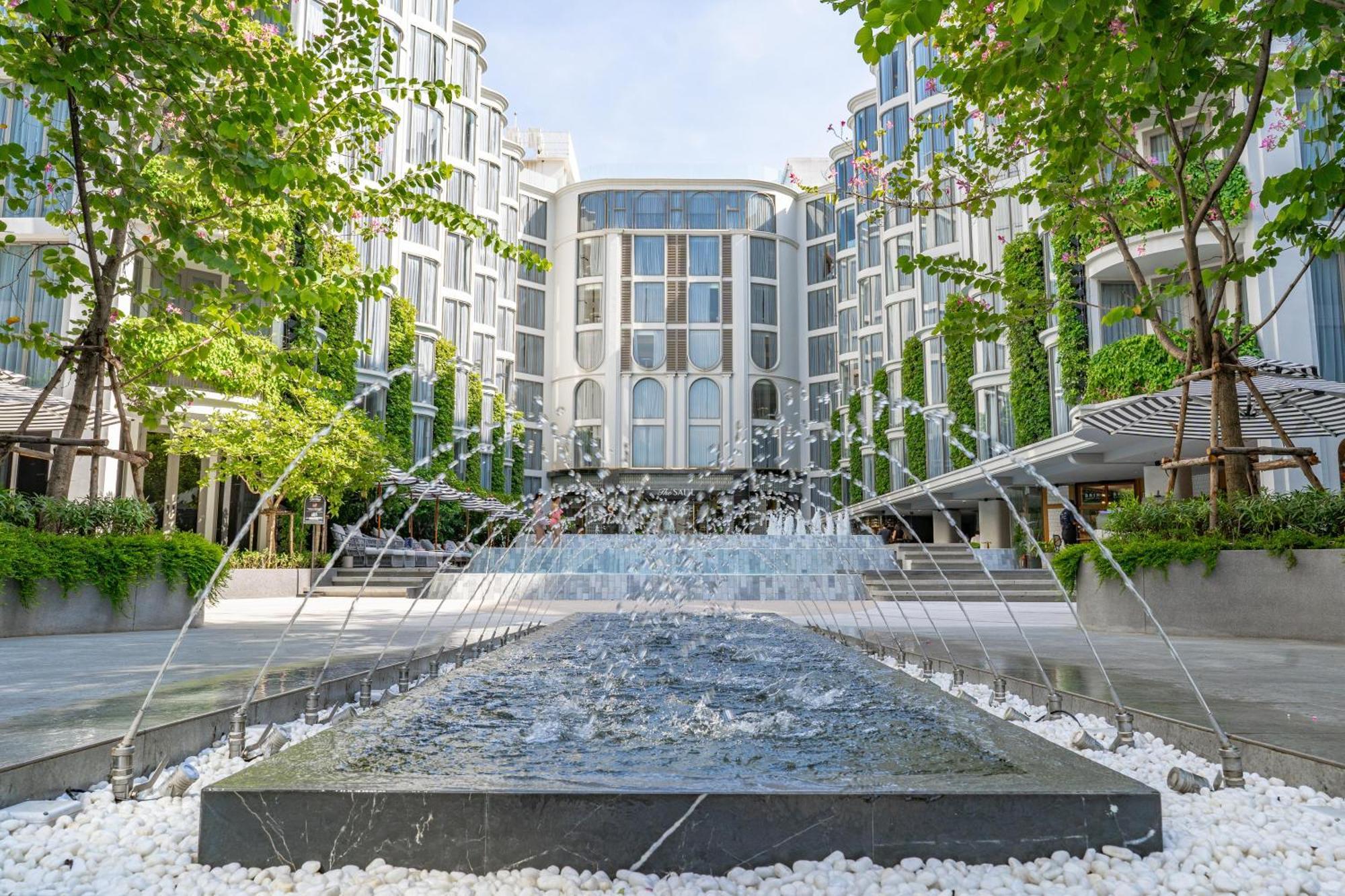 The Salil Hotel Riverside Bangkok Exterior photo The hotel's main entrance