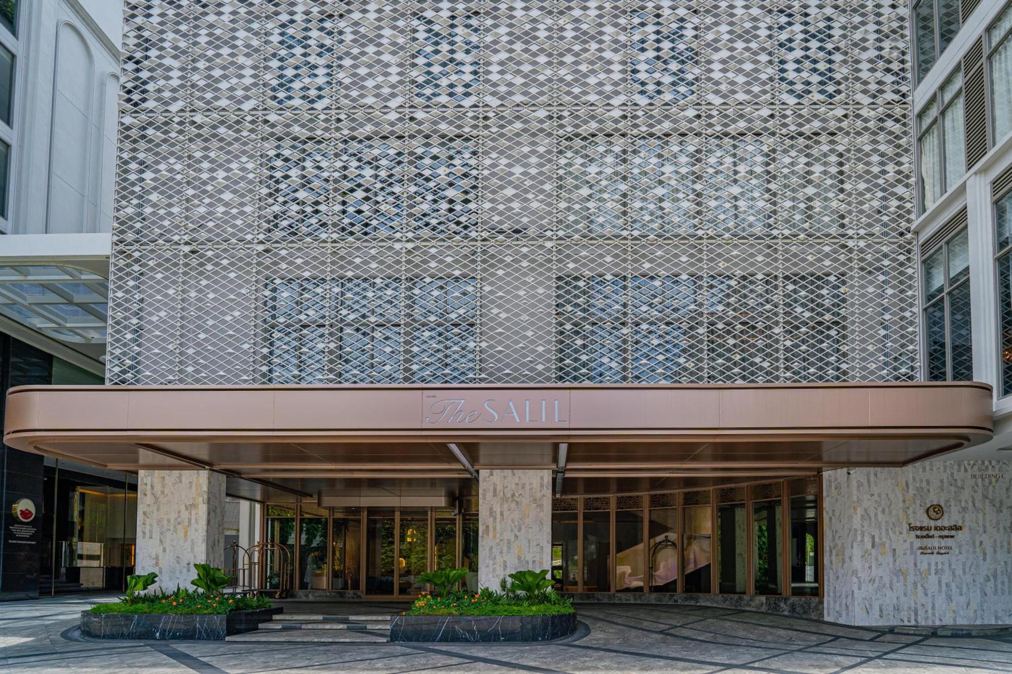 The Salil Hotel Riverside Bangkok Exterior photo Entrance of the hotel