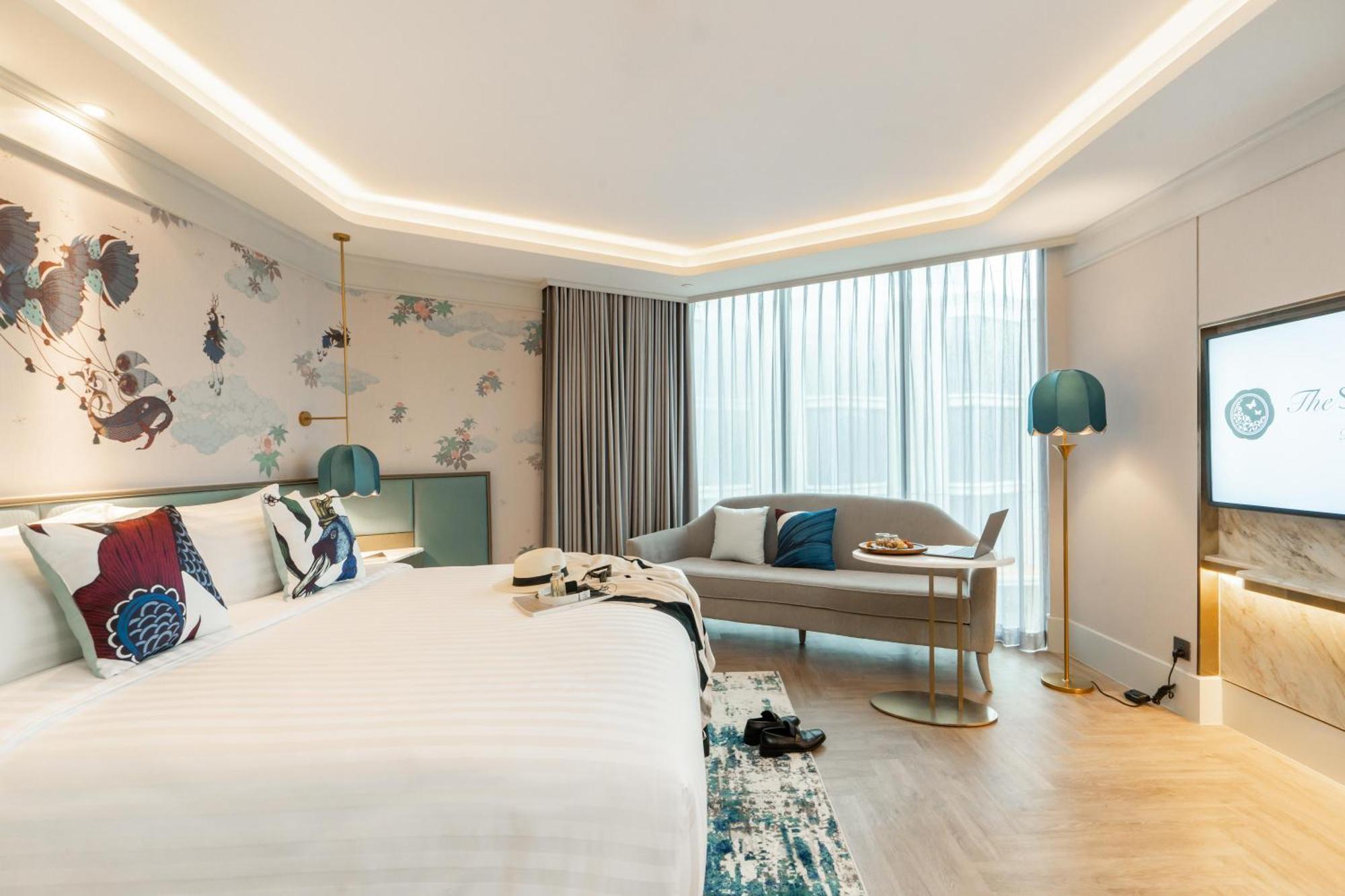 The Salil Hotel Riverside Bangkok Exterior photo Deluxe Room